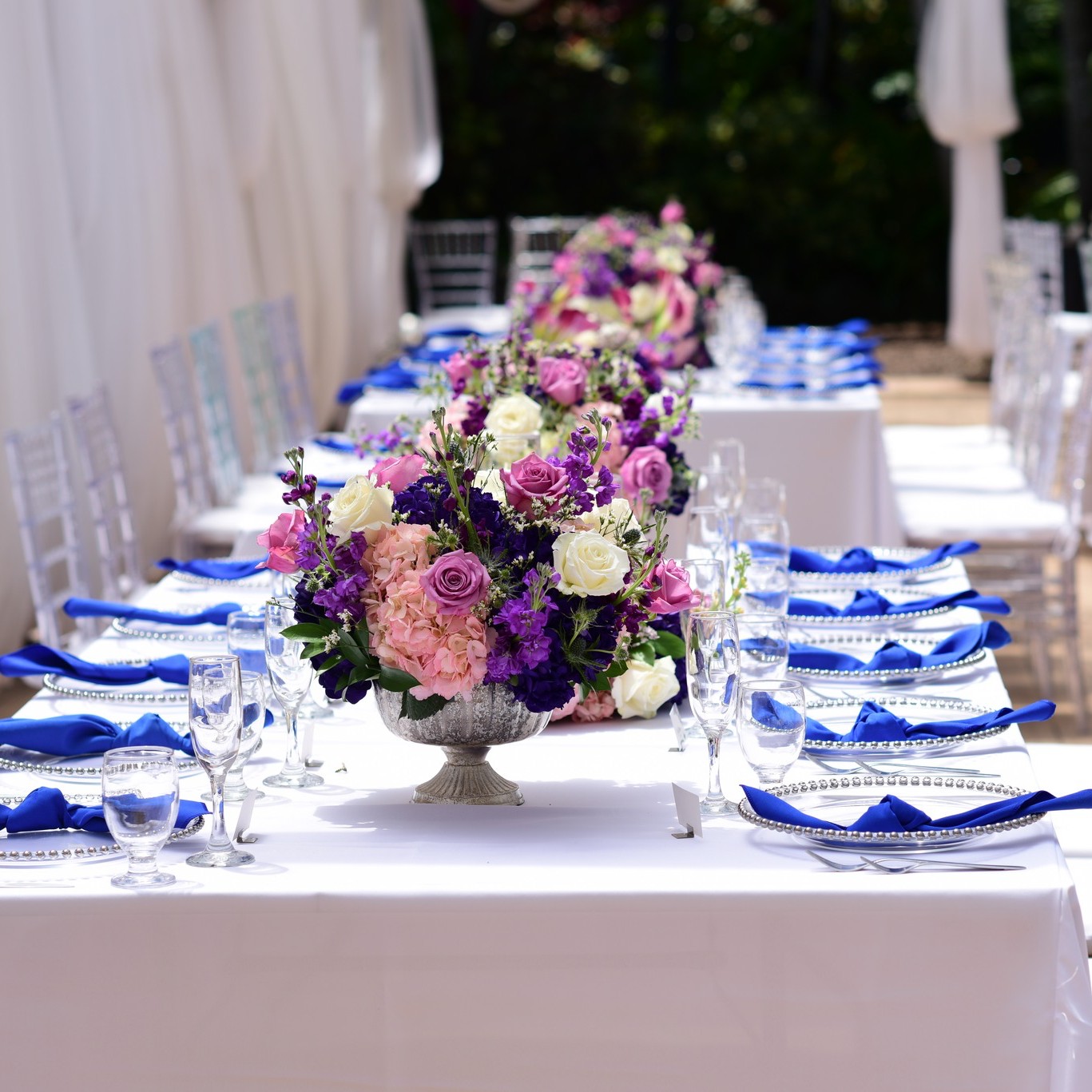purple and blue wedding reception decor and flowers